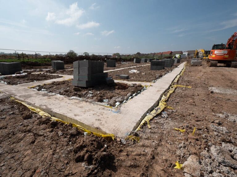 Concrete footings and blockwork on a residential development site.