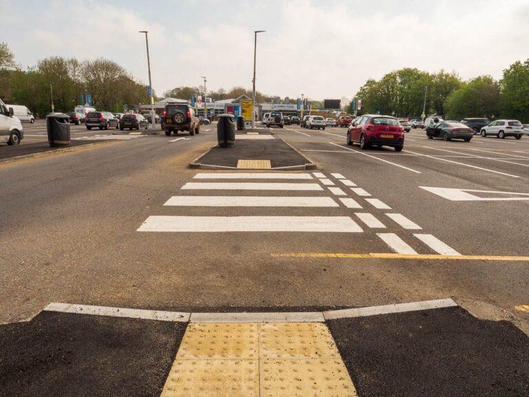New pedestrian crossing with tactile paving and kerbed island at Moto Leigh Delamere Services.