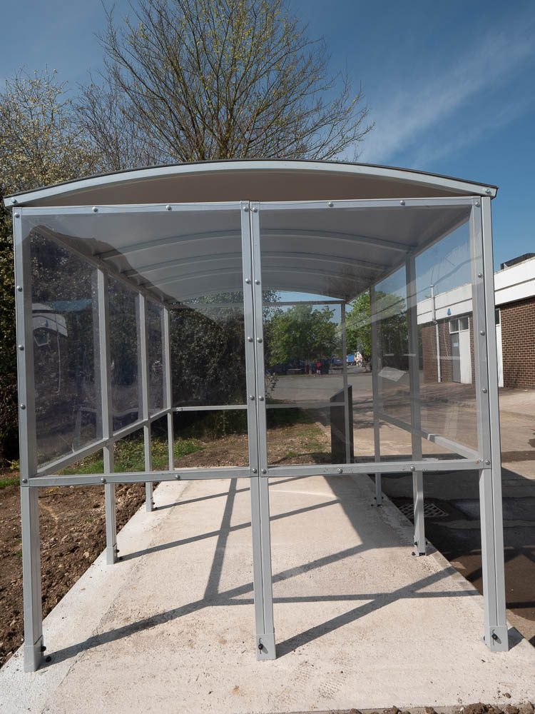 Smoking shelter on a new concrete base at Moto Leigh Delamere Services.