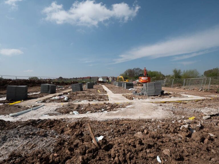 Wide view of foundations set out across a residential development.